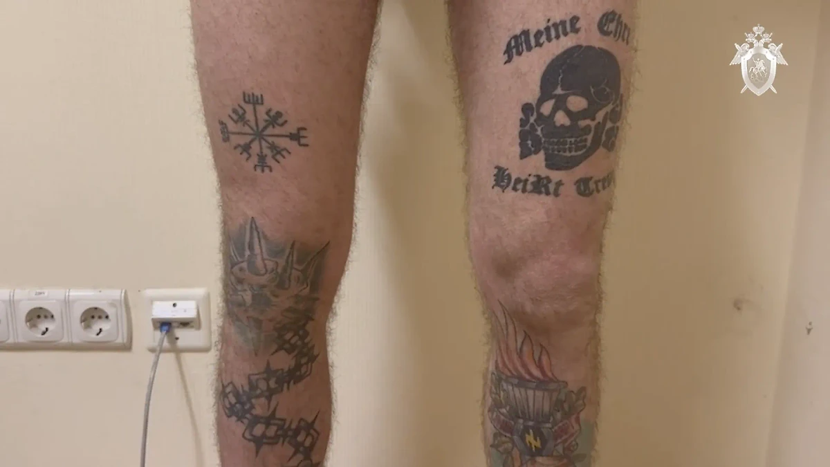 Татуировки осуждённых в ДНР азовцев* (фото демонстрируется в просветительских и информационных целях и без целей пропаганды). Скриншот © Telegram / Следком