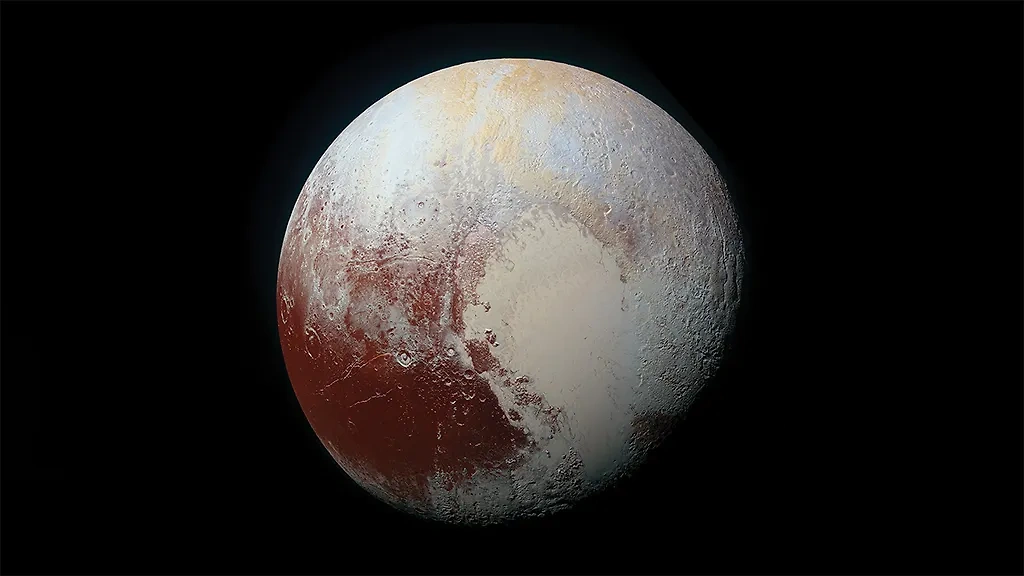 Плутон с отчётливо видной на его поверхности областью Томбо ("Сердце Плутона") на снимке зонда New Horizons. Обложка © nasa