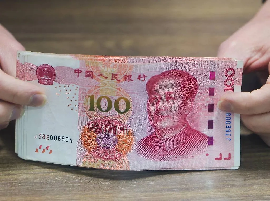Китайский юань. Обложка © ТАСС / Сергей Карпухин