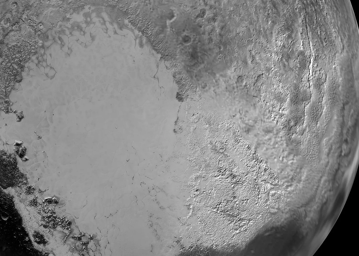 Область Томбо (Сердце Плутона). Его левая часть названа Равниной Спутника. Фото © Wikipedia / NASA