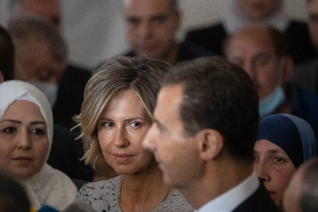 Президент Сирии Башар Асад с супругой Асмой в 2021 году. Обложка © ТАСС / AP / Hassan Ammar