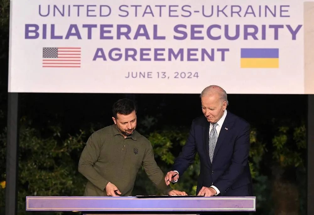 Главы Украины и США всё-таки подписали соглашение о гарантиях безопасности. Фото © ТАСС / ЕРА / Ettore Ferrari