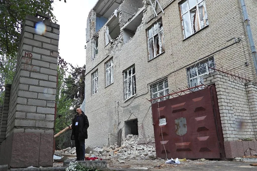 Разрушенное в результате обстрела ВСУ здание администрации в Херсоне. Обложка © ТАСС