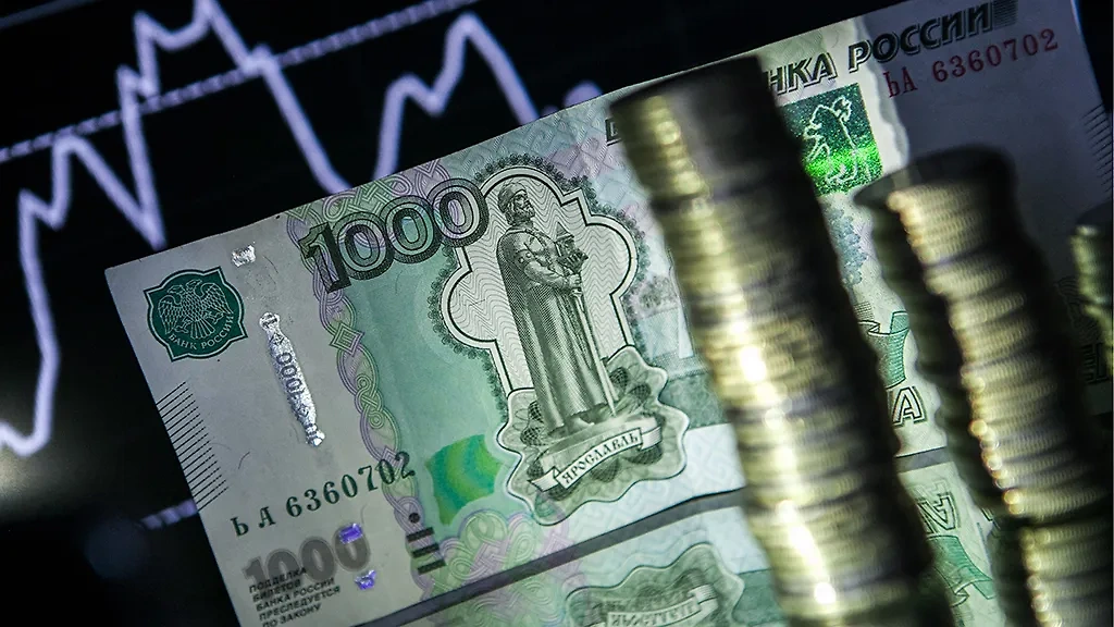 Экономисты рассказали, что будет с курсом рубля на следующей неделе. Обложка © ТАСС / Сергей Коньков