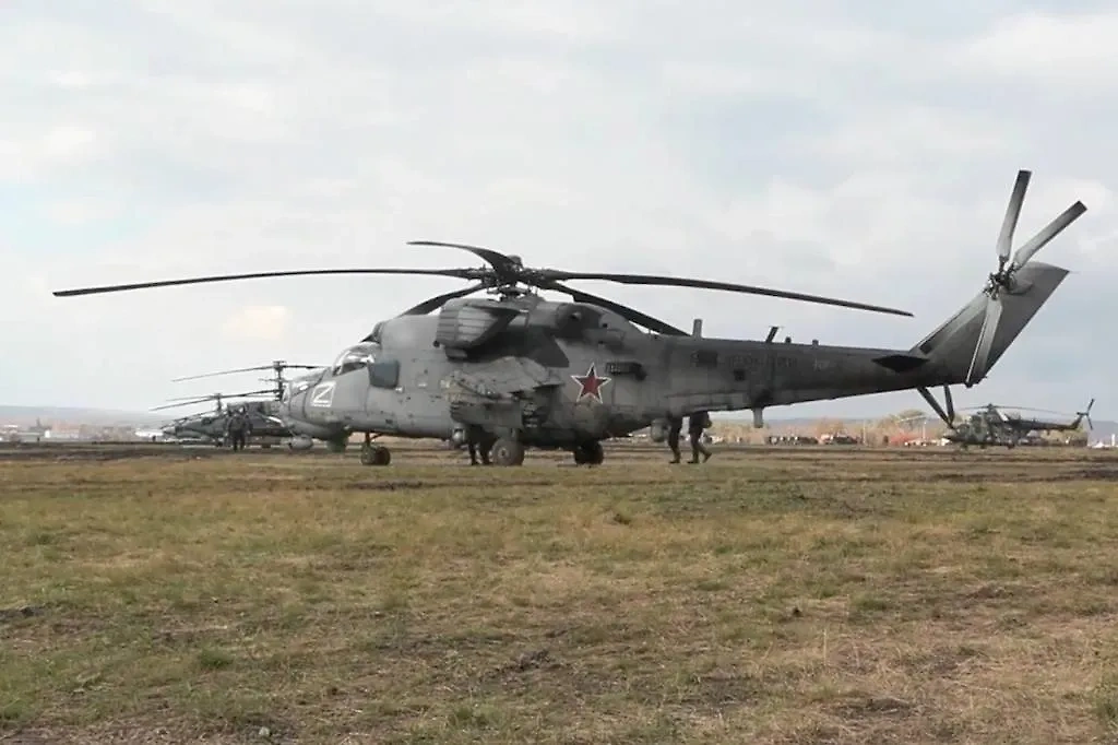 Боевая работа экипажей вертолётов Ми-35. Обложка © ТАСС / Пресс-служба Минобороны РФ