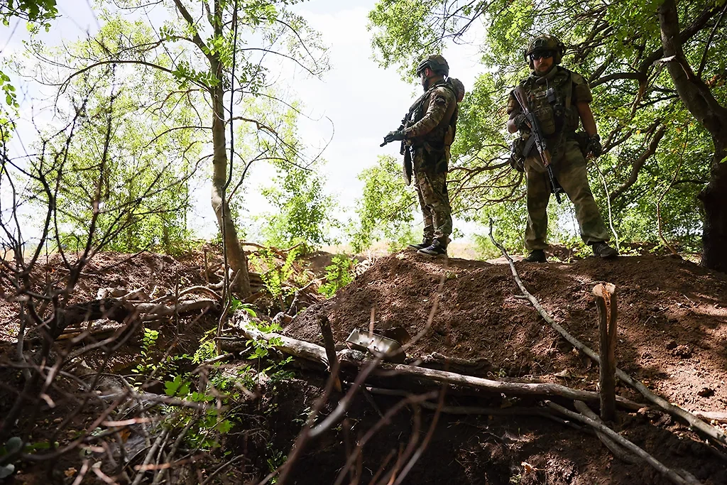 Военнослужащие диверсионно-разведывательного отряда во время штурма позиций в зоне проведения специальной военной операции. Фото © ТАСС / Александр Река