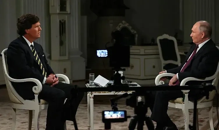 Американский журналист Такер Карлсон и президент России Владимир Путин. Обложка © kremlin