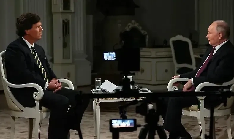 Американский журналист Такер Карлсон и президент России Владимир Путин. Обложка © kremlin