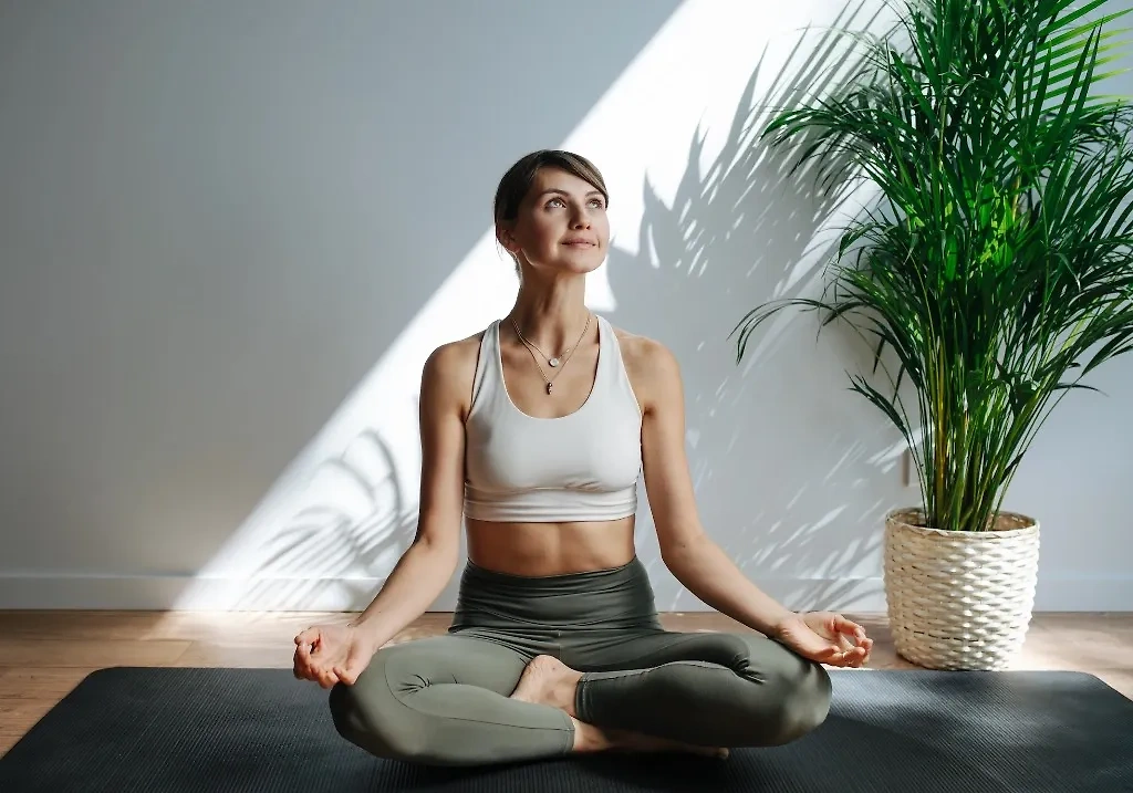 Йога учит сосредотачиваться и снижает стресс. Фото © Shutterstock