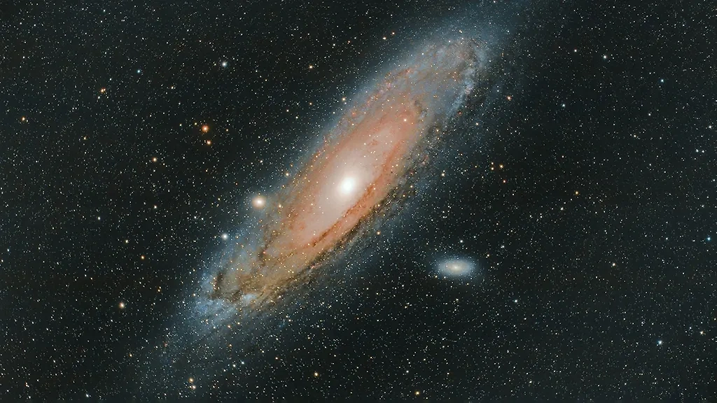 Галактика Андромеды, с которой в будущем столкнётся Млечный Путь. Обложка © Unsplash / Gaëtan Othenin-Girard