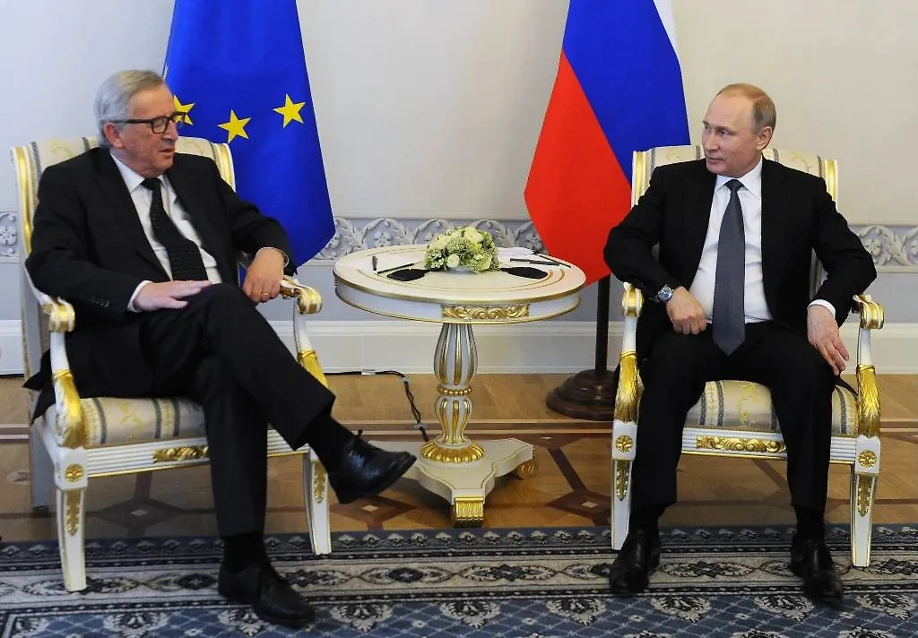 Жан-Клод Юнкер и Владимир Путин. Обложка © ТАСС / Климентьев Михаил
