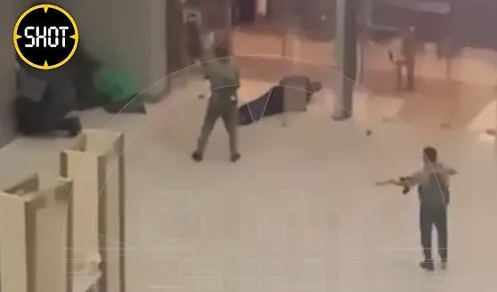 Террористы в "Крокусе". Скриншот из видео © SHOT
