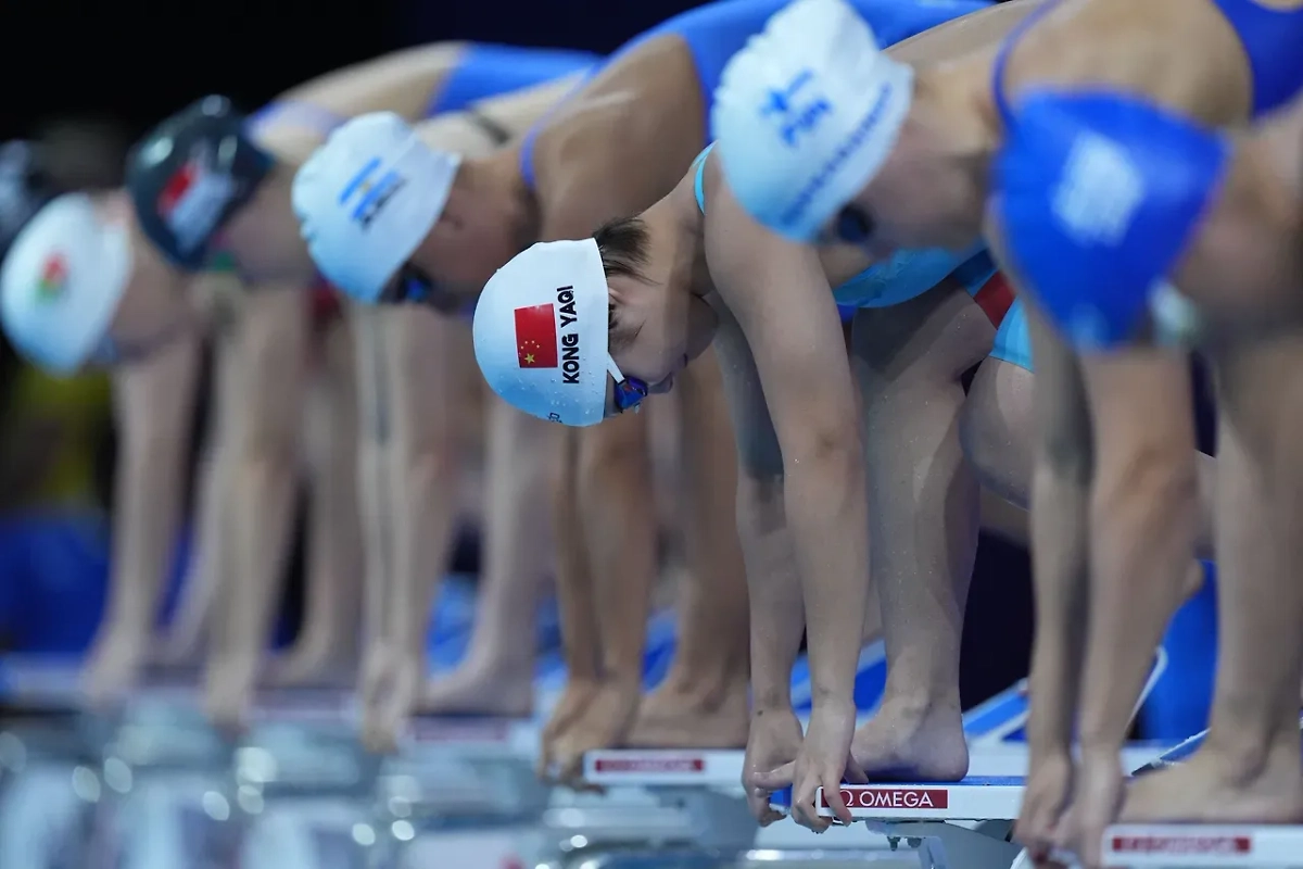 Пловцы на старте. Обложка © Wolrld Aquatics