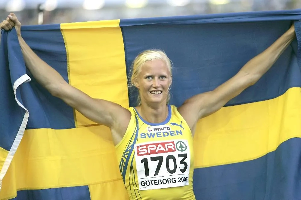 Олимпийская чемпионка по лёгкой атлетике Каролина Клюфт. Обложка © ТАСС / Роберт Максимов