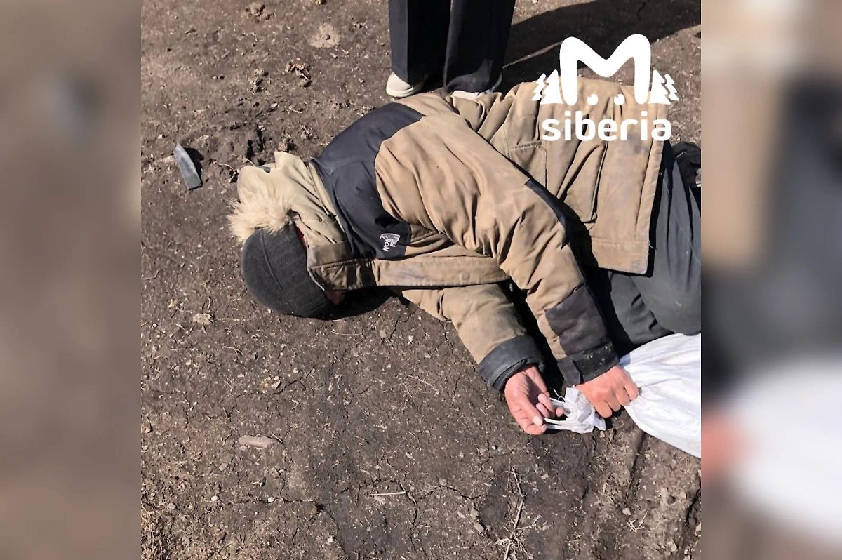 Задержанный мужчина. Фото © Telegram / Mash Siberia