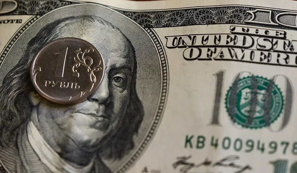 Экономисты назвали новый ориентир для курса доллара к рублю. Обложка © ТАСС / Александр Манзюк