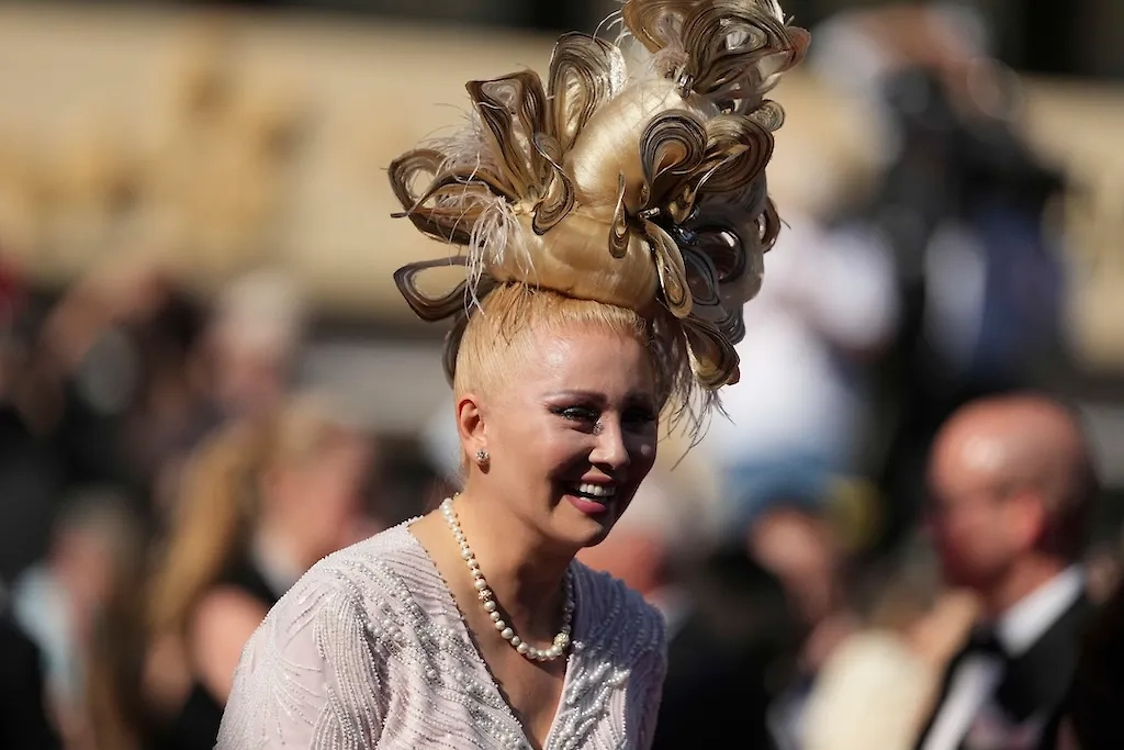 Лена Ленина и её причёска. Обложка © ТАСС / AP / Natacha Pisarenko