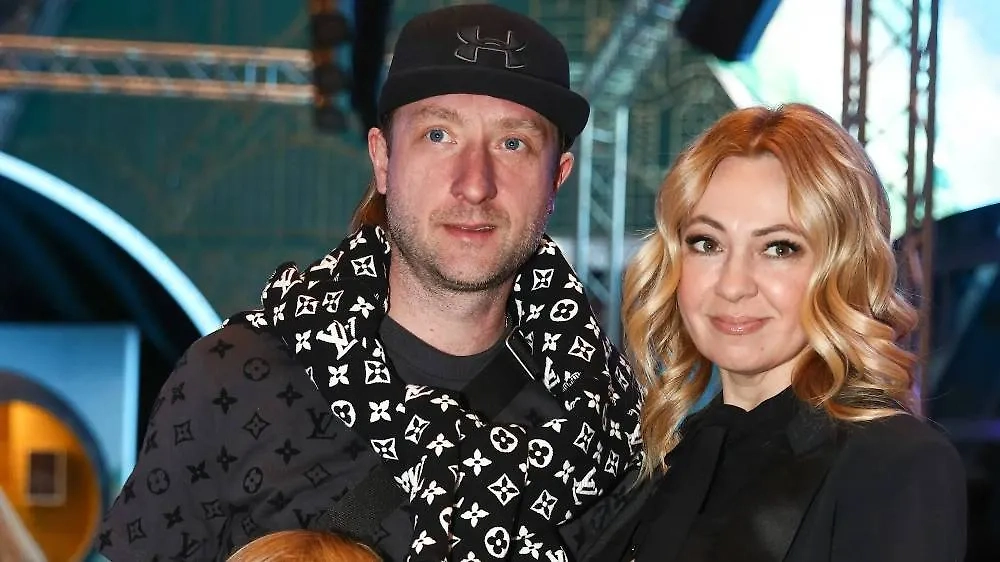 Яна Рудковская и Евгений Плющенко. Обложка © ТАСС / Сергей Бобылев