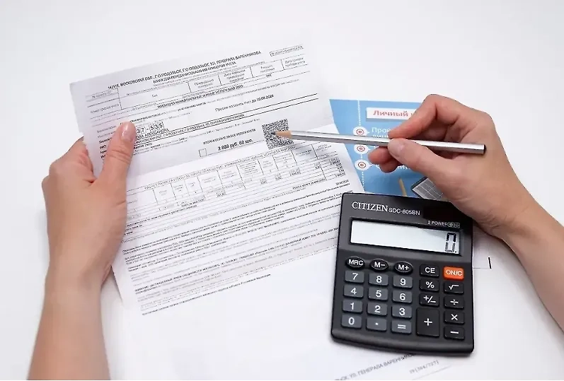 Счета ЖКХ. Обложка © Shutterstock / FOTODOM / igorykor