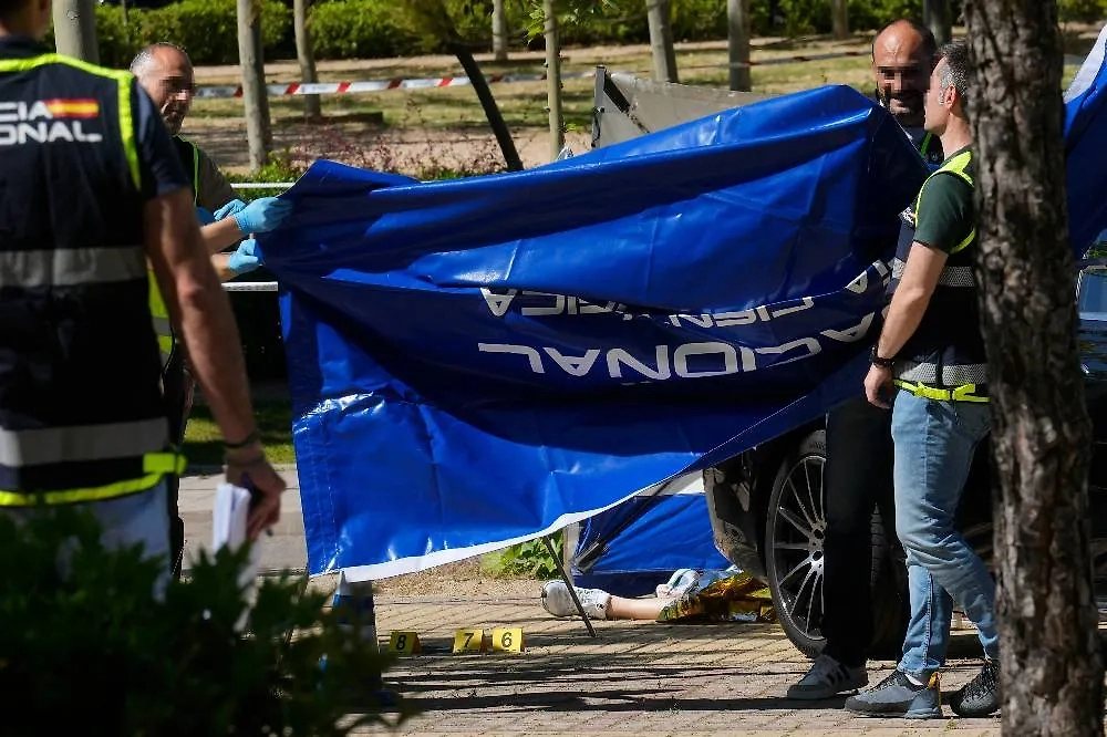 Испания. Мадрид. Полиция на месте убийства Портнова возле Американской школы Мадрида. Фото © ТАСС / ЕРА / BORJA SANCHEZ-TRILLO