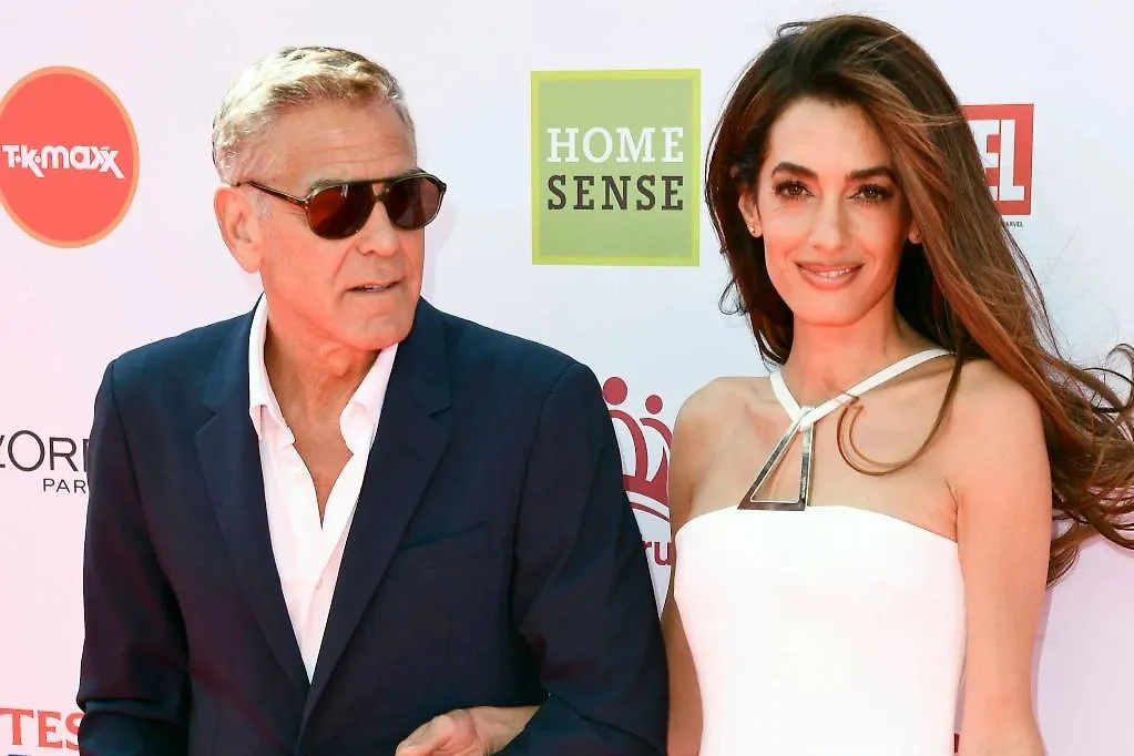 Актёра Джордж Клуни со своей женой Амаль. Обложка © ТАСС / IMAGO/Future Image