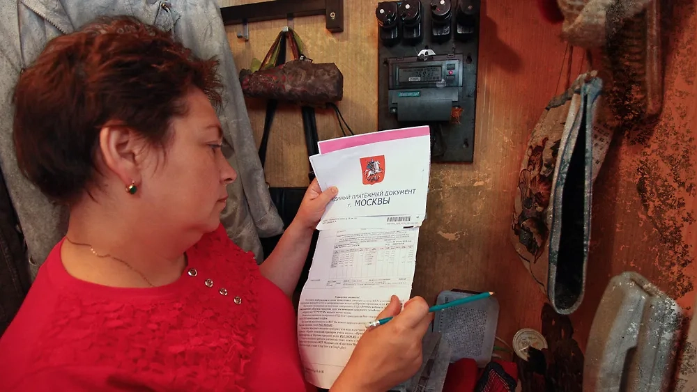 Новые тарифы ЖКХ с июля 2025: сколько доплатят россияне. Обложка © ТАСС / Александр Щербак