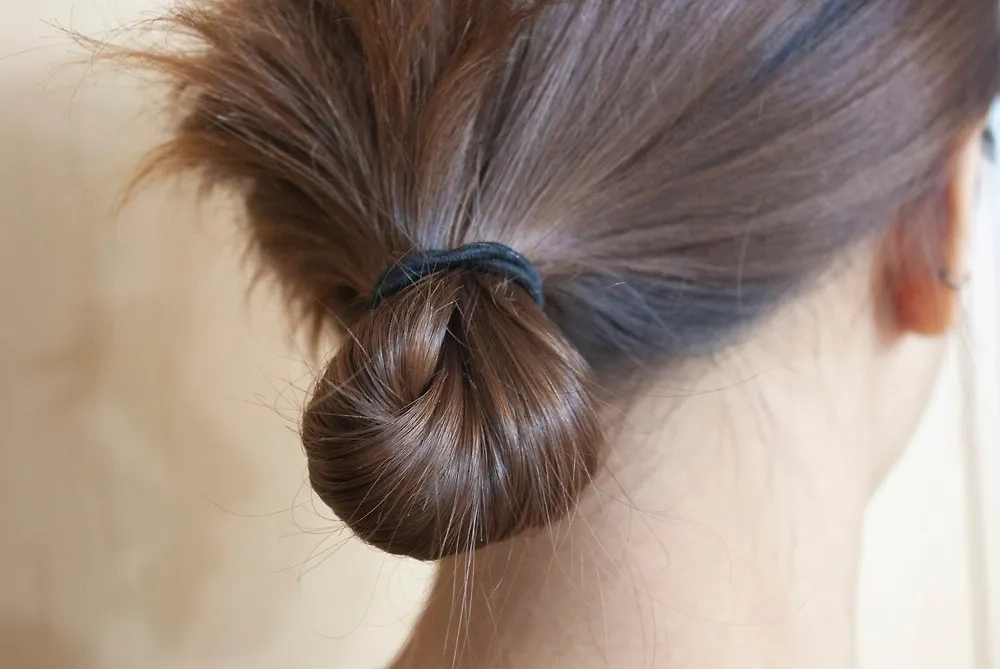 Для идеальной причёски важно выбирать мягкие и объёмные резинки. Обложка © Shutterstock / FOTODOM / wonderwilluv