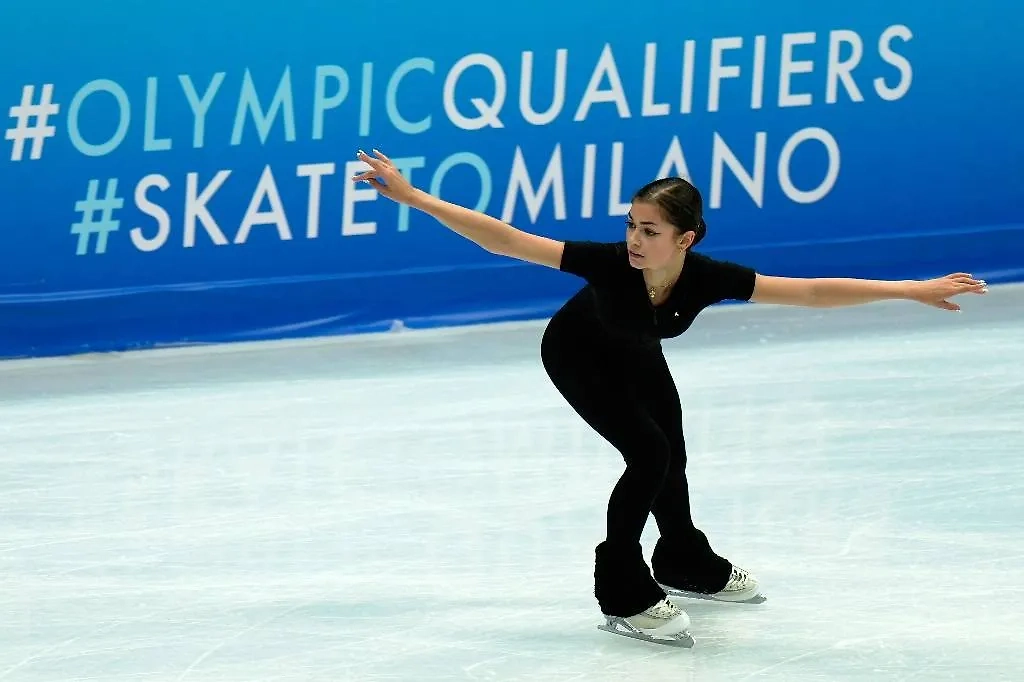 Аделия Петросян на тренировке в Пекине. Обложка © ТАСС / AP / Mahesh Kumar A.