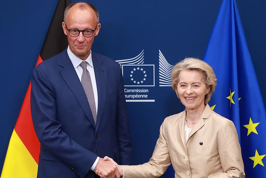 Мерц и Фон дер Ляйен. Обложка © ТАСС / OLIVIER HOSLET