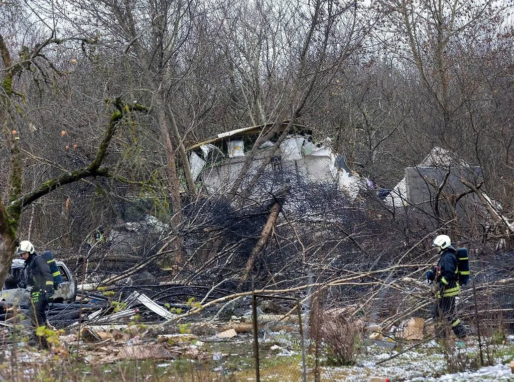 Обломки упавшего под Вильнюсом самолёта. Обложка © ТАСС / АР