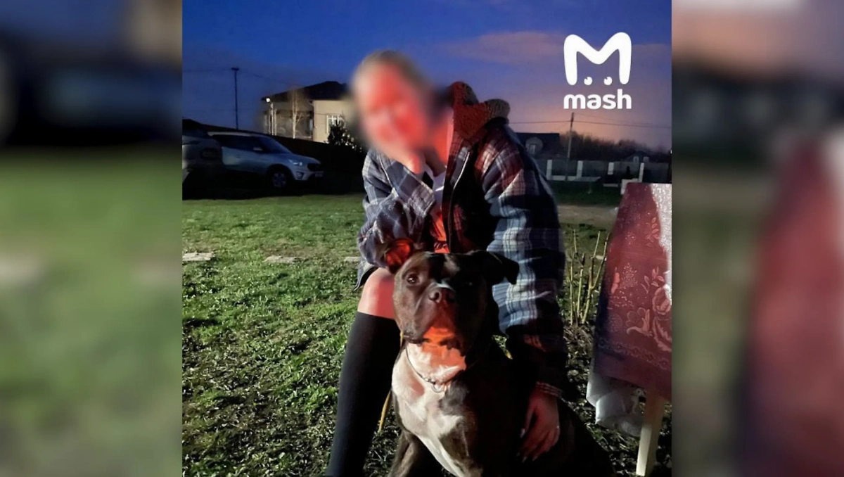 Хозяйка со своей собакой. Фото © Telegram / Mash