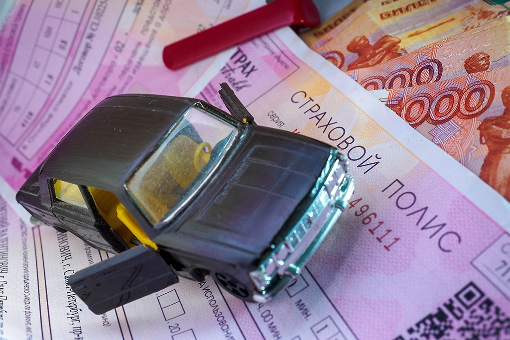 Эксперты рассказали, от чего зависят тарифы ОСАГО. Обложка © ТАСС / Семён Лиходеев