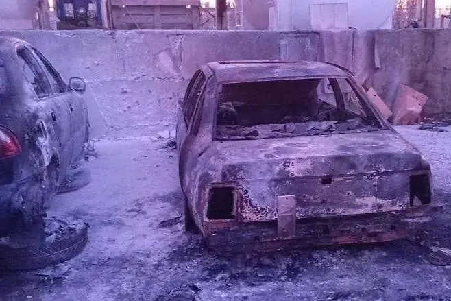 Сгоревшая машина в Херсонской области. Обложка © VK / Владимир Сальдо