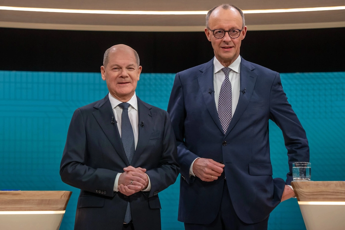 Олаф Шольц и Фридрих Мерц. Обложка © ТАСС/ POOL / MICHAEL KAPPELER 