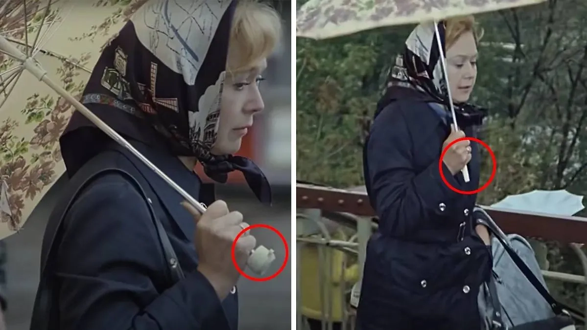 Зонт Ольги Рыжовой имеет способность к изменению внешнего вида в «Служебном романе». Фото © Кадры из фильма «Служебный роман» Эльдара Рязанова. Кадр © YouTube / Киноконцерн «Мосфильм»