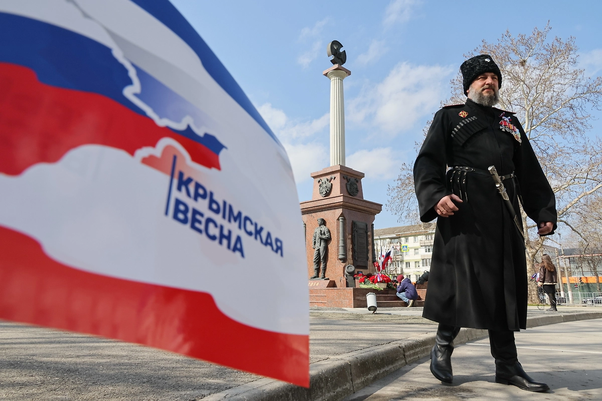 Как отмечается день воссоединения Крыма с Россией. Фото © ТАСС / Сергей Мальгавко