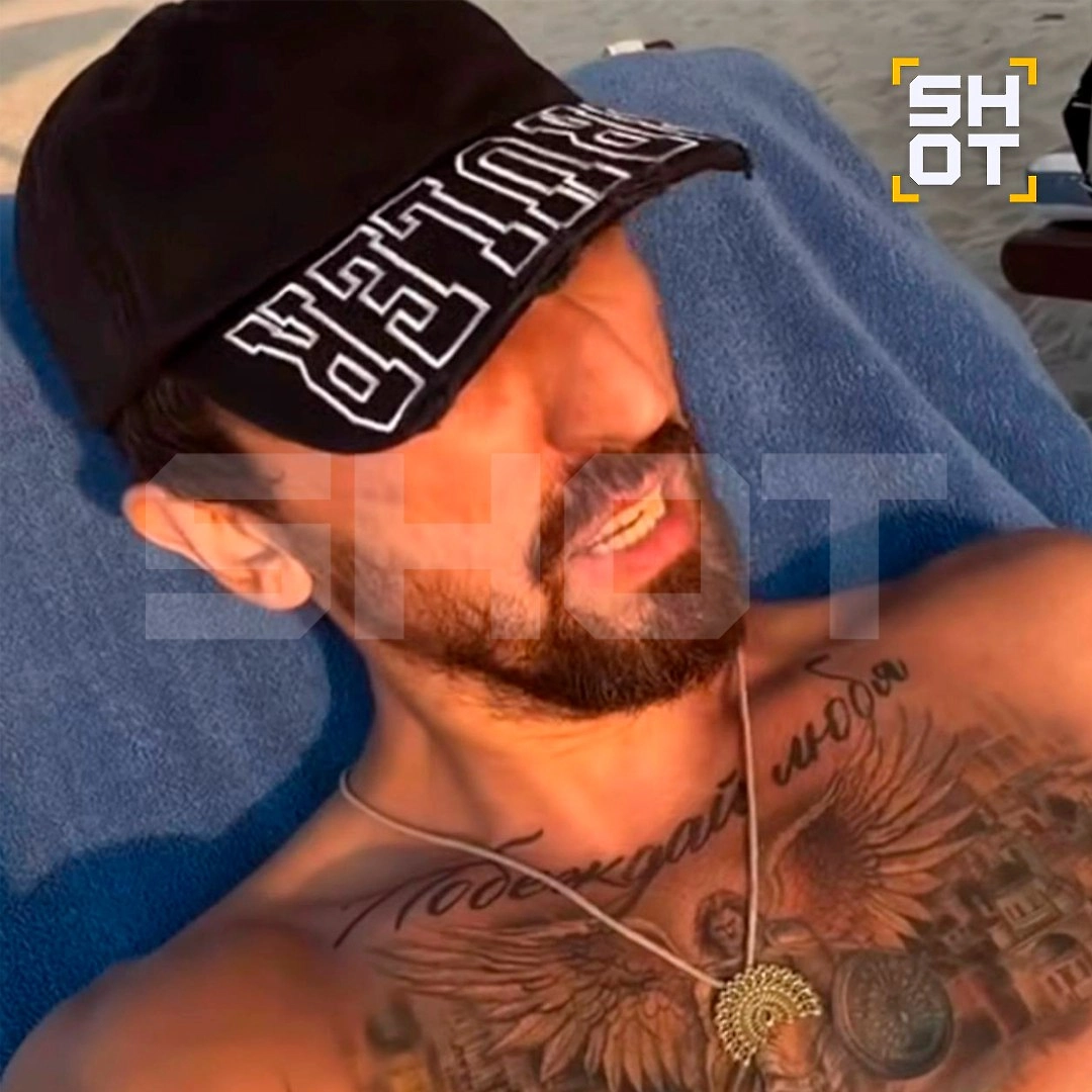 Россиянин с татуировкой. Фото © Telegram / SHOT