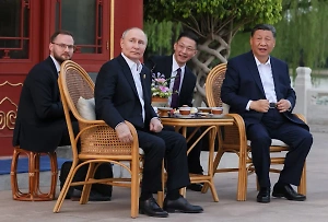 В чаепитии Путина и Си Цзиньпина нашли тайный знак