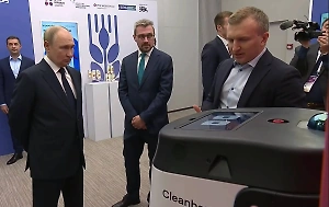 Путину на выставке АСИ показали разработку школьника-гения