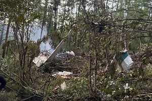 На месте крушения Ан-24 в Приамурье работают 205 человек и 34 единицы техники