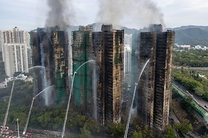 Названа возможная причина смертоносного пожара в Гонконге