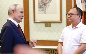 Путин вспомнил русскую поговорку на встрече с китайским инженером Пэн Паем