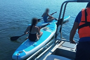 Уплыли без жилетов и пропали: На Красноярском море спасли троих беспечных сапбордистов