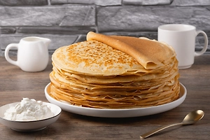 Онищенко переложил вину в прибавке веса с масленичных блинов на алкоголь