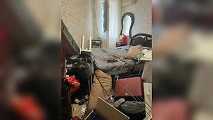 Стриптизёр из Красногорска, выносивший тело сожительницы в чемоданах, попал на видео