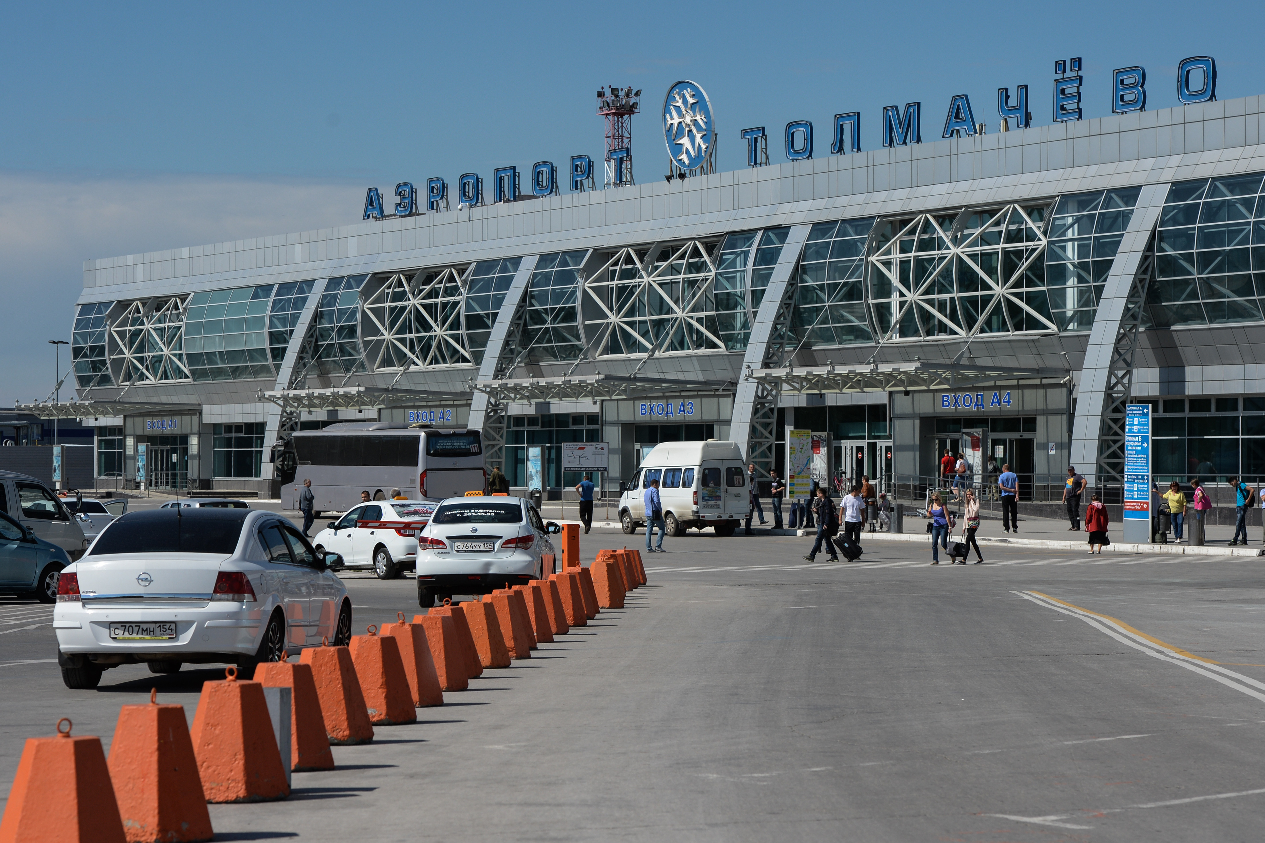 Погода аэропорт новосибирск. Международный аэропорт Толмачево Новосибирск. Толмачева аэропорт Новосибирск. Аэропорт Толмачево Международный терминал. Новосибирский аэропорт Толмачево новый.