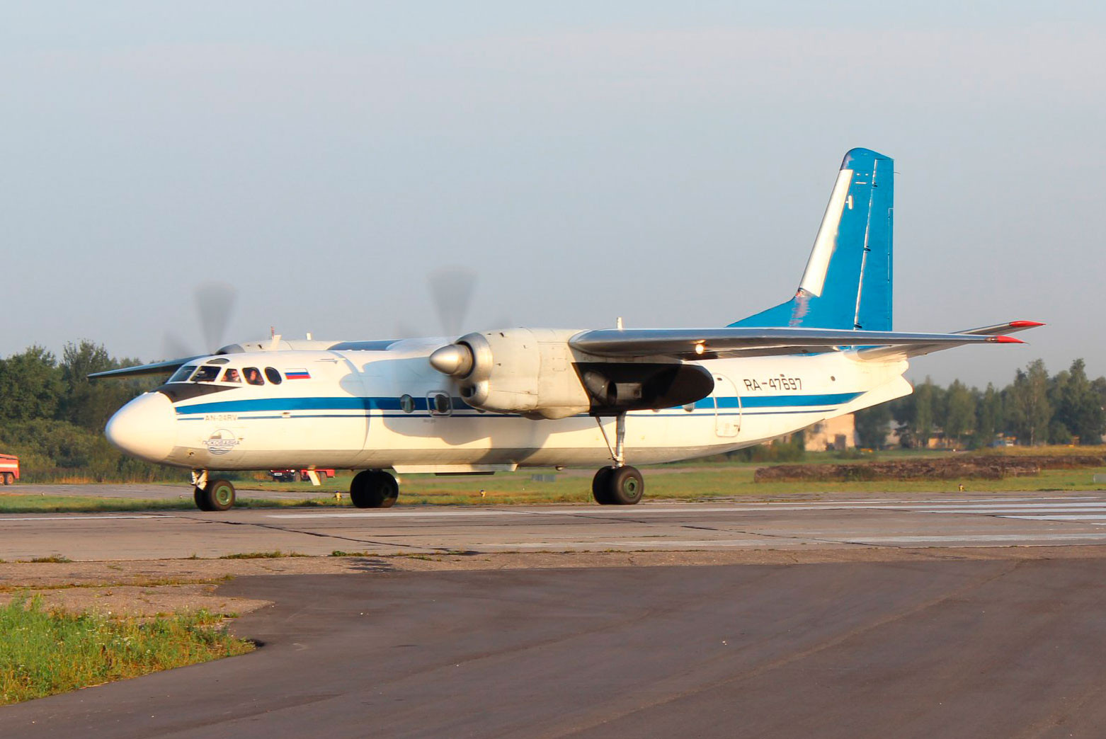 Авиабилеты хибины санкт петербург. Ан24 в аэропорту Магадан. АН 24 аэропорт Йошкар-Ола. Пассажирский ан24 Украина. Авиакомпания AJ Казахстан ан24.