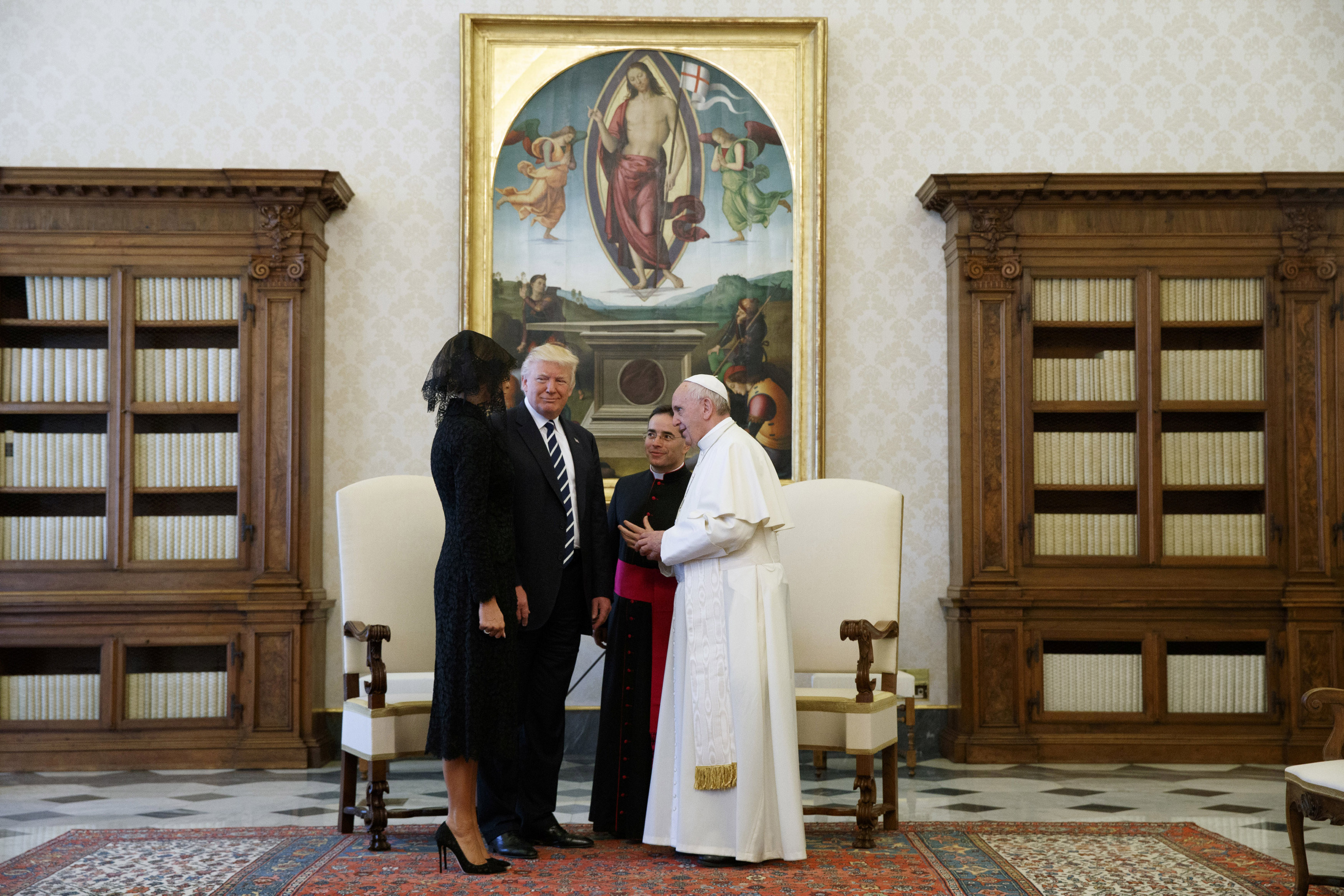 Дональд Трамп с супругой Меланьей&nbsp;на встрече с папой римским. Фото: &copy;&nbsp;REUTERS/Evan Vucci/Pool