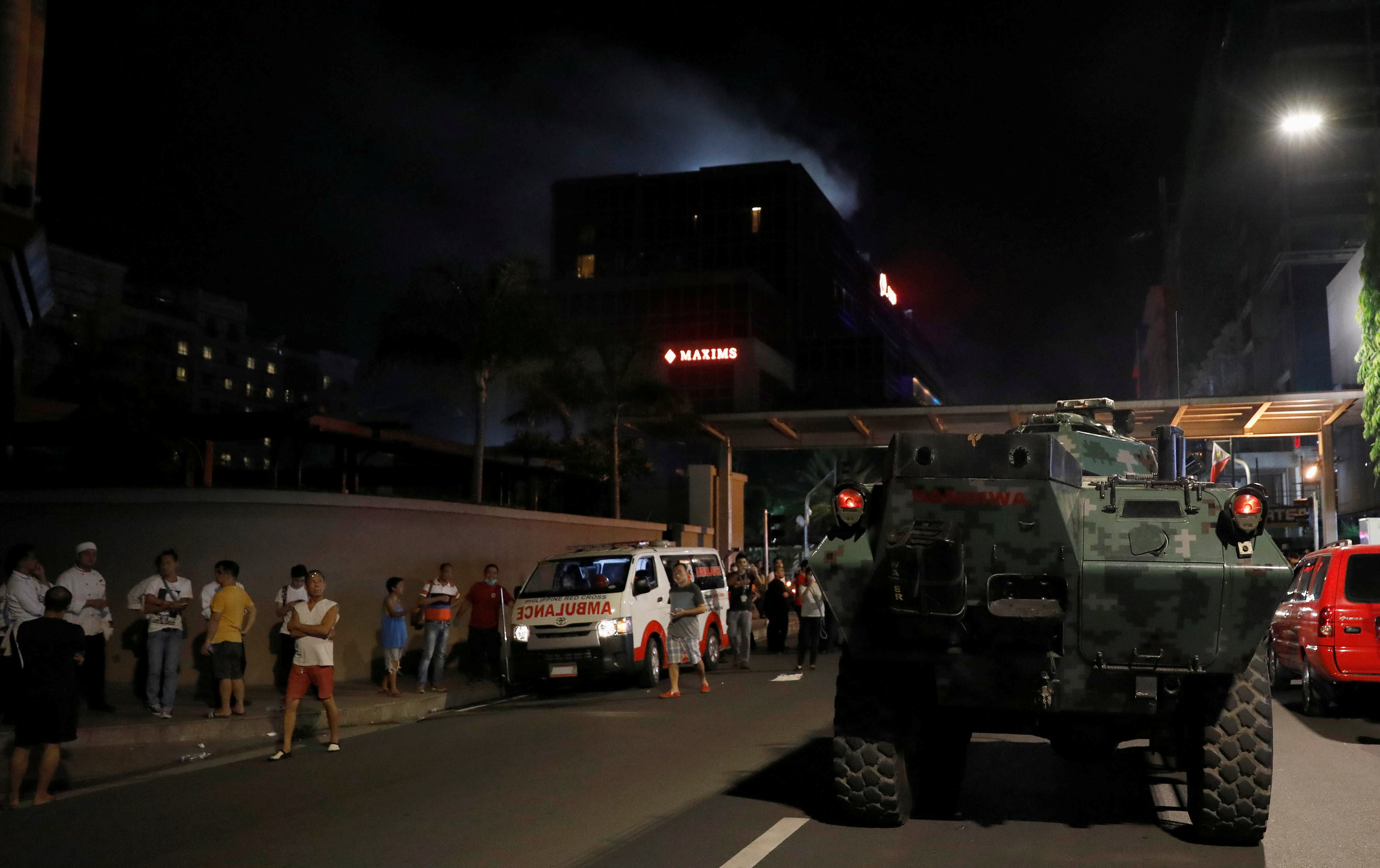 У атакованного отеля в Маниле. Фото: &copy;&nbsp;REUTERS/Erik De Castro