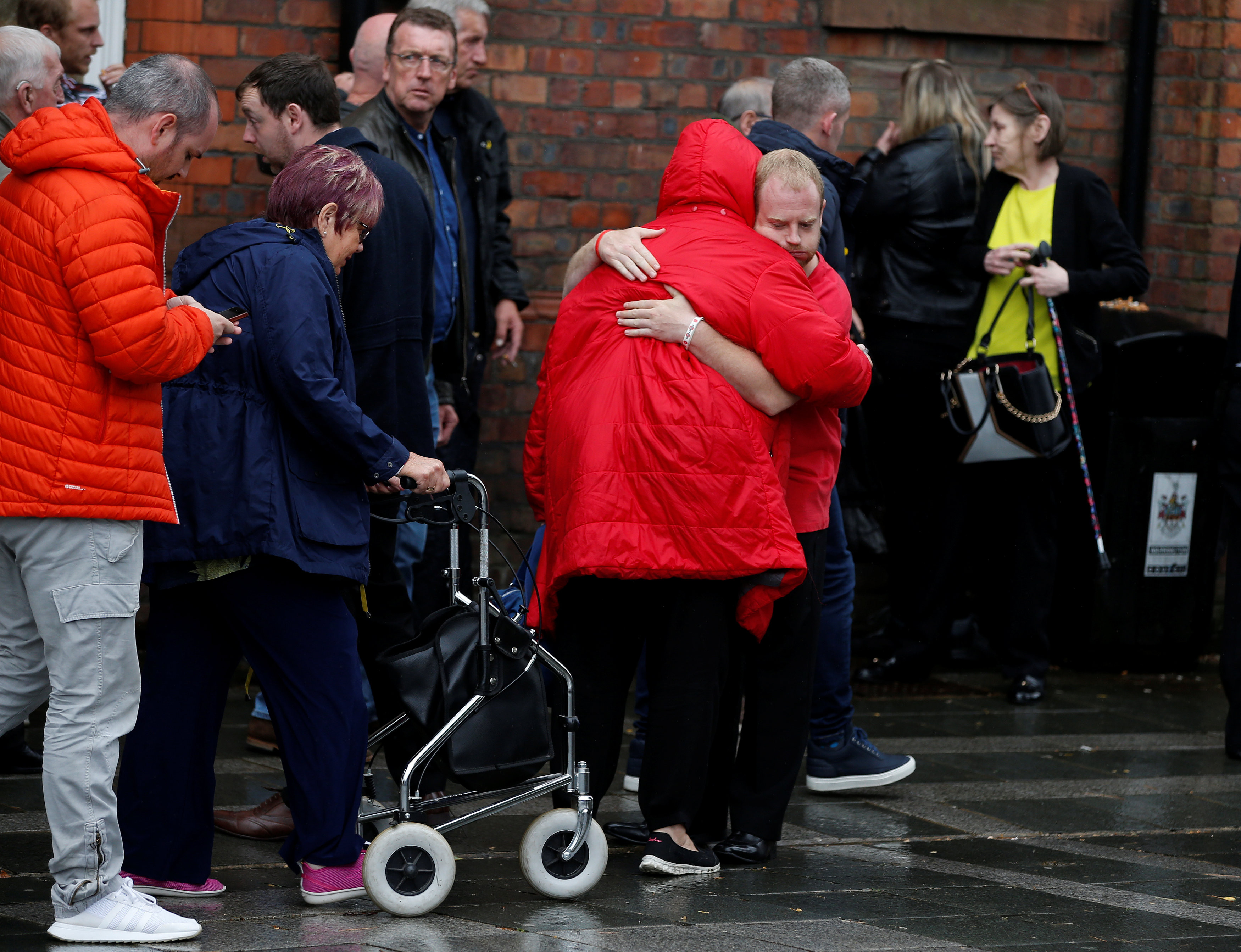 Родственники жертв перед заседанием. Фото: &copy; Reuters/Andrew Yates